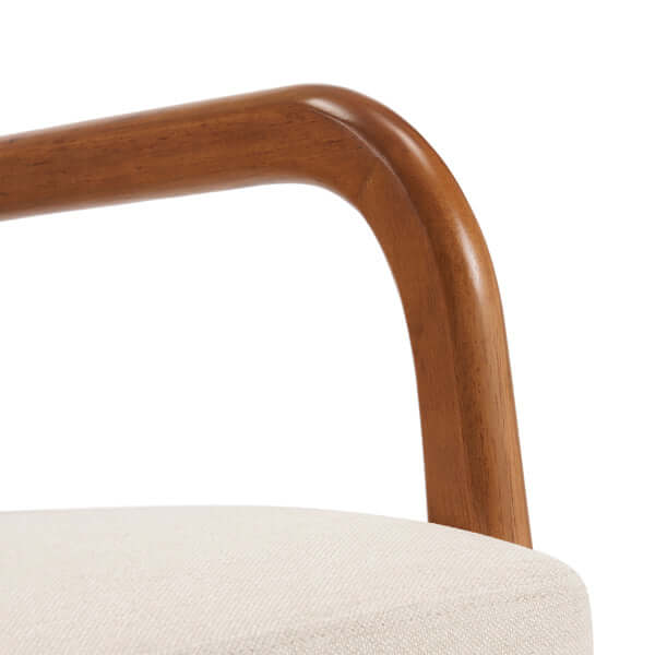 Breathable off-white linen upholstery detail on a high-back armchair