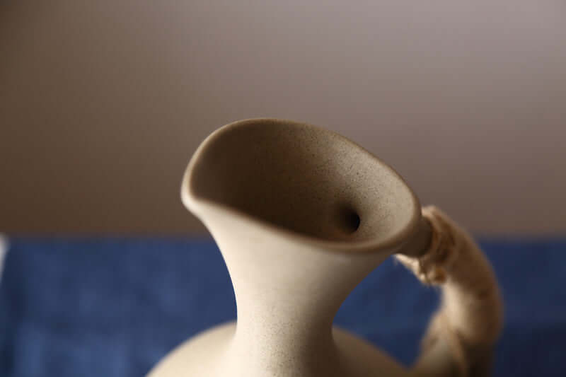 Close-up of matte ceramic finish on a healthy pottery kettle