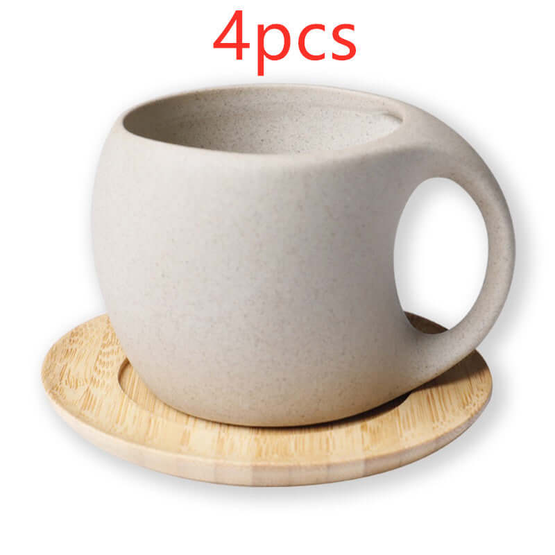 Handcrafted ceramic kettle set with one cup and bamboo tray, showcasing eco-friendly materials in Nordic style.