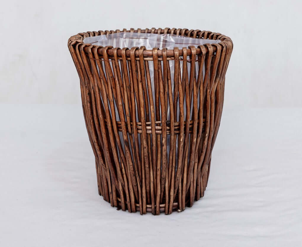 Handmade natural willow wicker planter with waterproof liner, perfect for Boho rustic indoor plants.