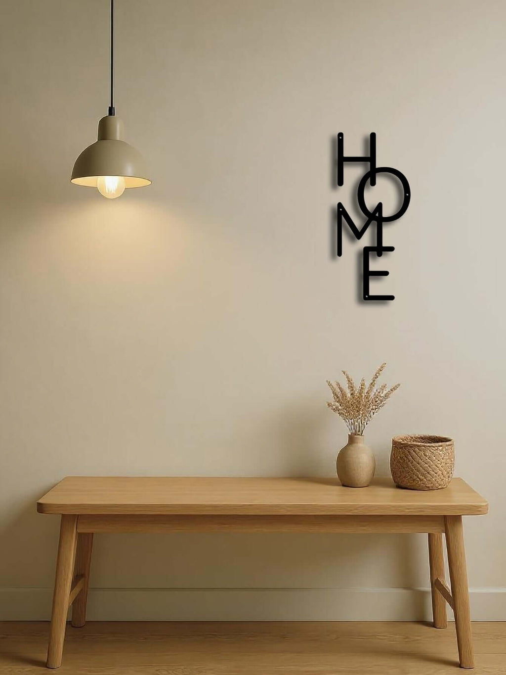 Minimalist metal "HOME" wall art mounted above a wooden table, adding a cozy touch to the living space.
