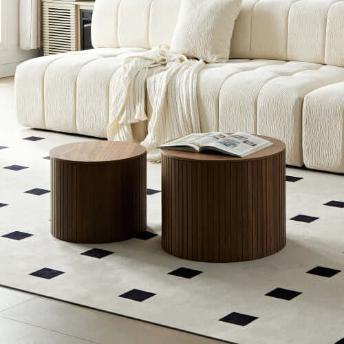 Stylish living room interior featuring the walnut nesting coffee tables as a central decor piece on a rug.