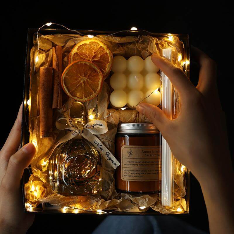 Luxury aromatherapy candle and oil gift set in an elegant box with lights, perfect for relaxation and special occasions.