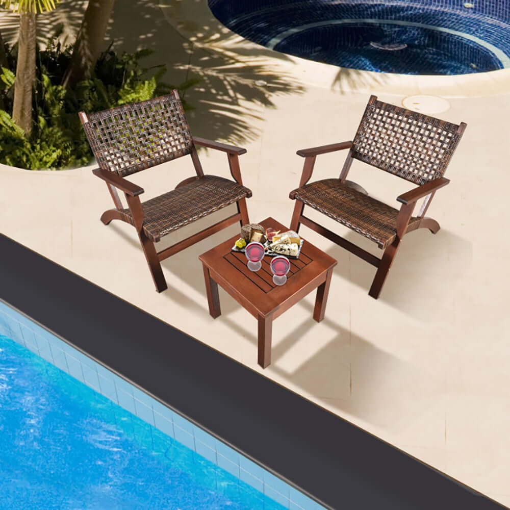 3-piece rattan patio set by the pool with two chairs and a table, perfect for outdoor relaxation.