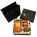 Luxury aromatherapy scented candle and oil gift set in a black box