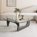  Minimalist living room setup featuring the mid-century glass coffee table as a sculptural centerpiece.