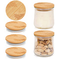 4-pack eco-friendly bamboo lids for Oui yogurt jars on white background