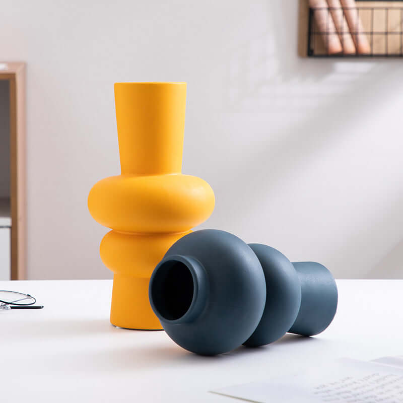 Nordic Minimalist Ceramic Vase in yellow and blue, modern geometric flower pot for stylish home decor.