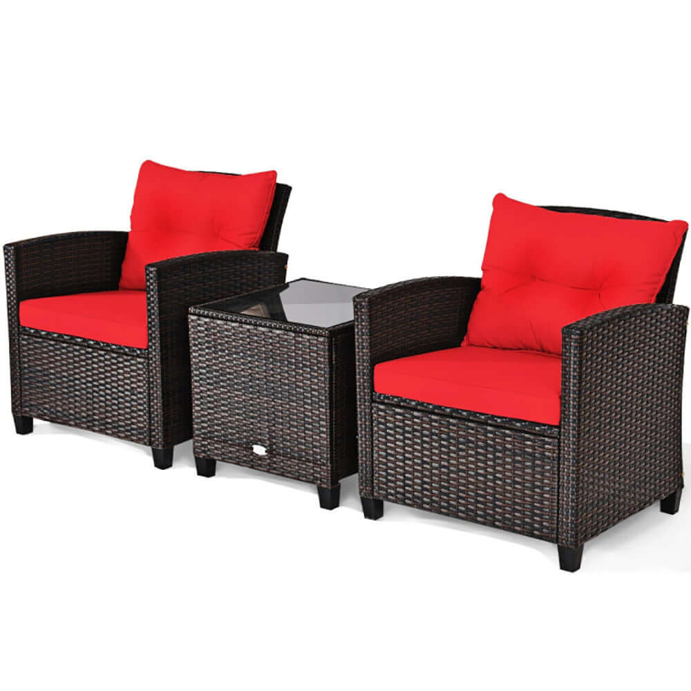 3 piece outdoor rattan bistro set with red cushions and glass top coffee table