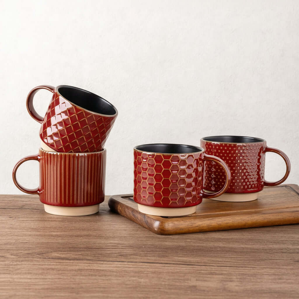Enjoying a fresh cup of coffee in a Rythmic Red GBHOME ceramic mug at a clean, modern coffee station.